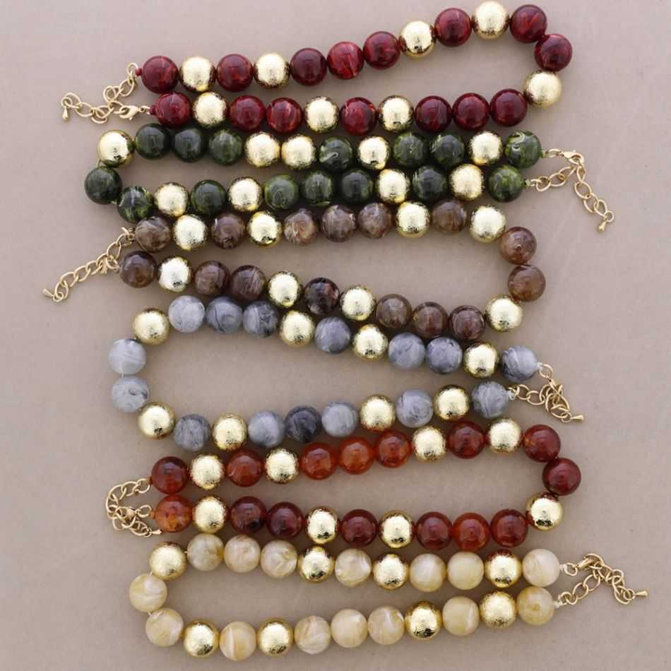 CHOKER WITH BEADS, BALLS, METALLIC FINISH, AND RESIN