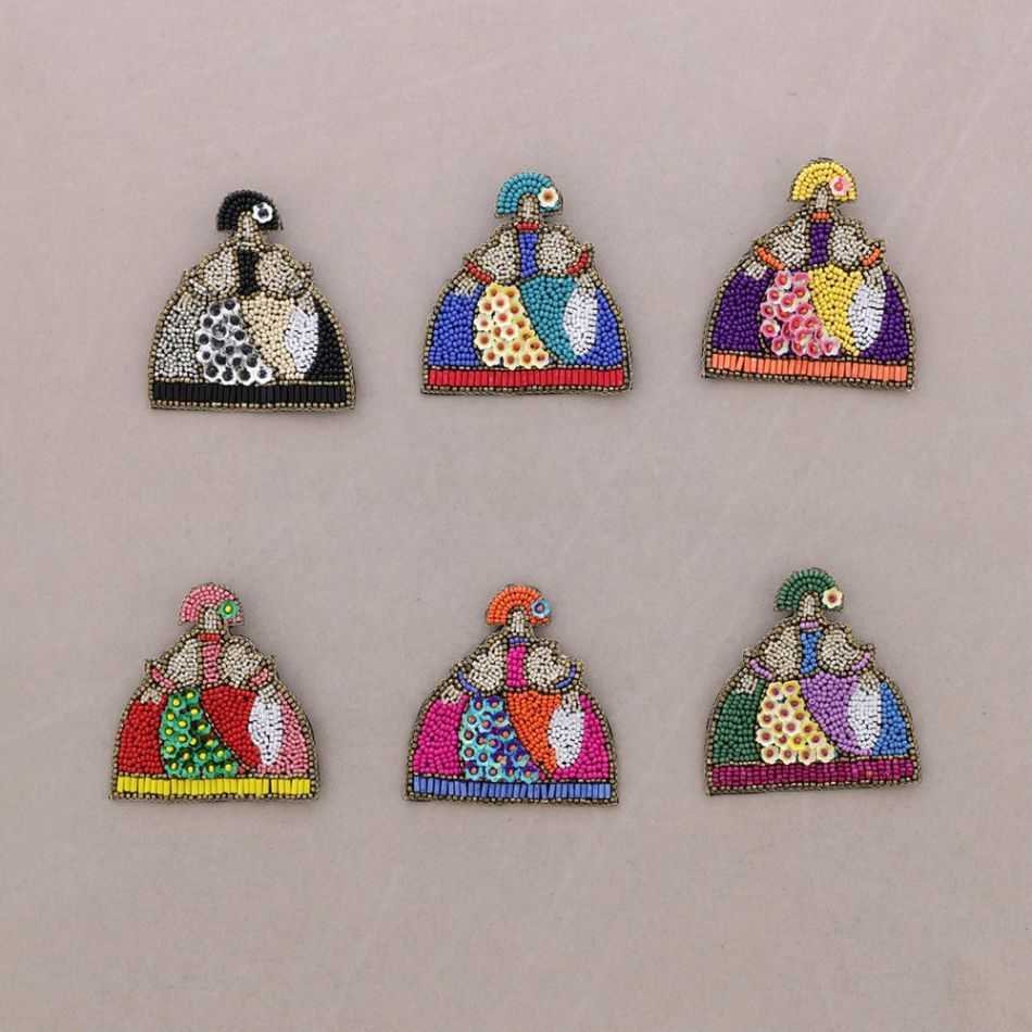 BROCHE MENINA ABALORIOS LENTEJUELAS