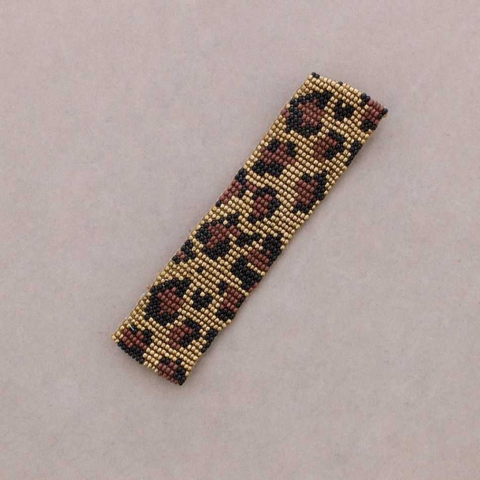 ETHNIC MACRAME BRACELET WITH ANIMAL PRINT AND BEADS