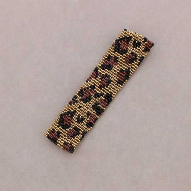 ETHNIC MACRAME BRACELET WITH ANIMAL PRINT AND BEADS