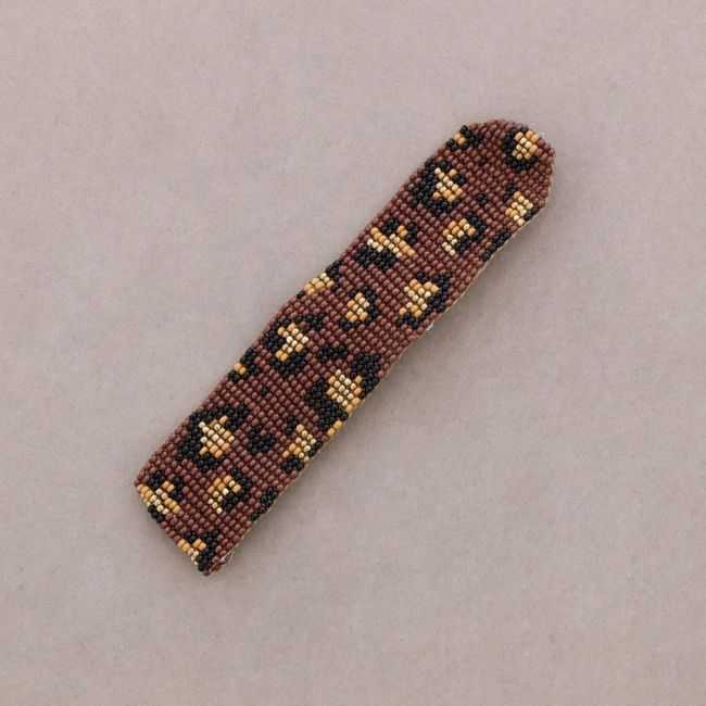 ETHNIC MACRAME BRACELET WITH ANIMAL PRINT AND BEADS