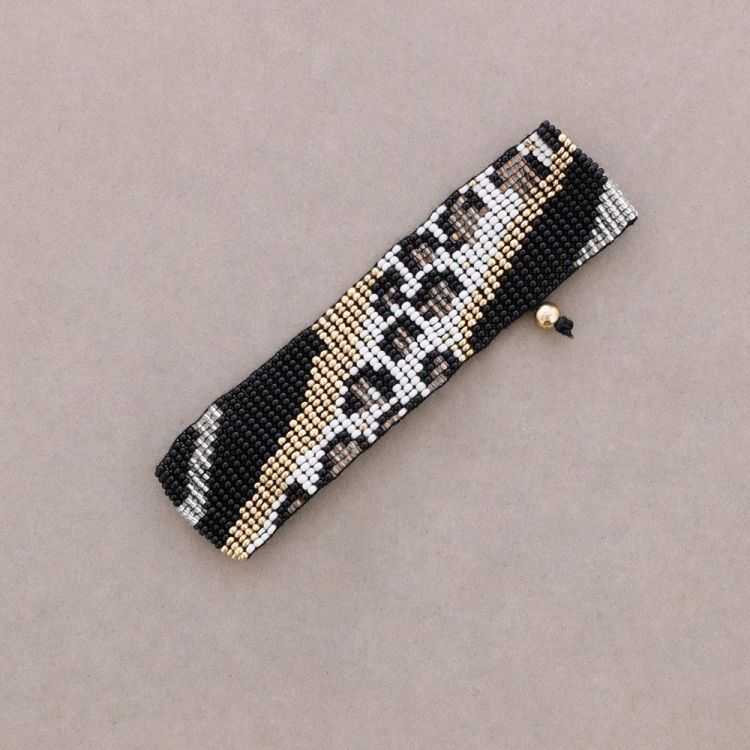 ETHNIC MACRAME BRACELET WITH ANIMAL PRINT AND BEADS