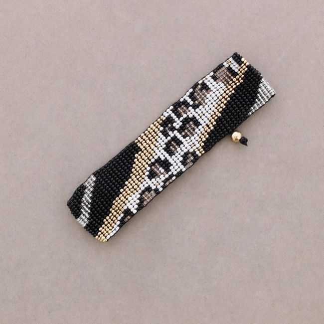 ETHNIC MACRAME BRACELET WITH ANIMAL PRINT AND BEADS