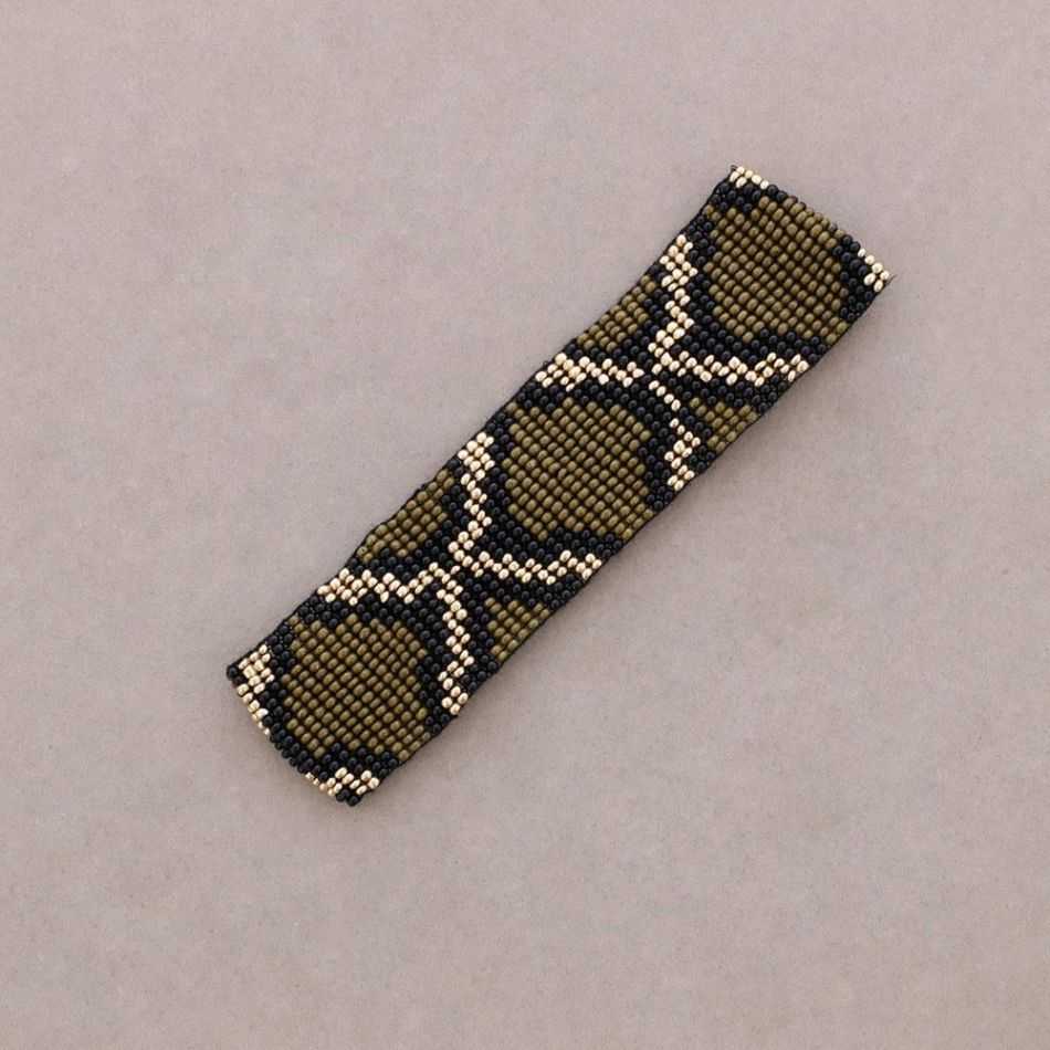ETHNIC MACRAME BRACELET WITH ANIMAL PRINT AND BEADS