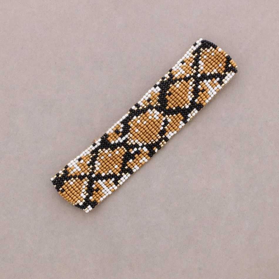 ETHNIC MACRAME BRACELET WITH ANIMAL PRINT AND BEADS