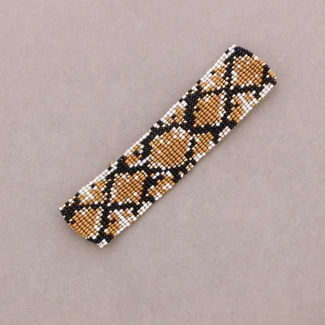 ETHNIC MACRAME BRACELET WITH ANIMAL PRINT AND BEADS