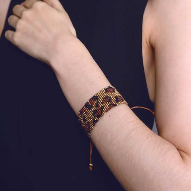 ETHNIC MACRAME BRACELET WITH ANIMAL PRINT AND BEADS