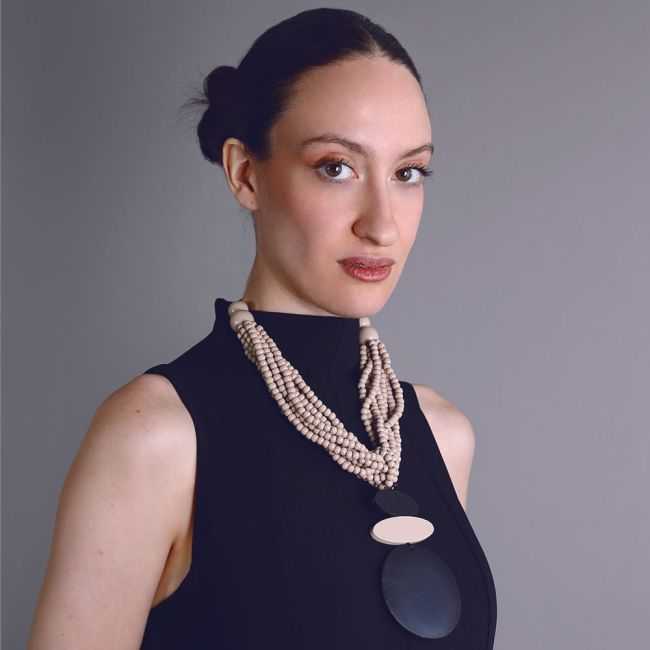 MULTI-WRAPPED CHOKER WITH WOODEN MEDAL PENDANTS