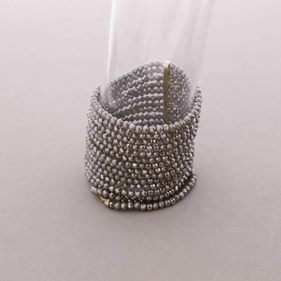 PULSERA ELÁSTICA MULTI CUENTAS CRISTALES FACETADOS METAL