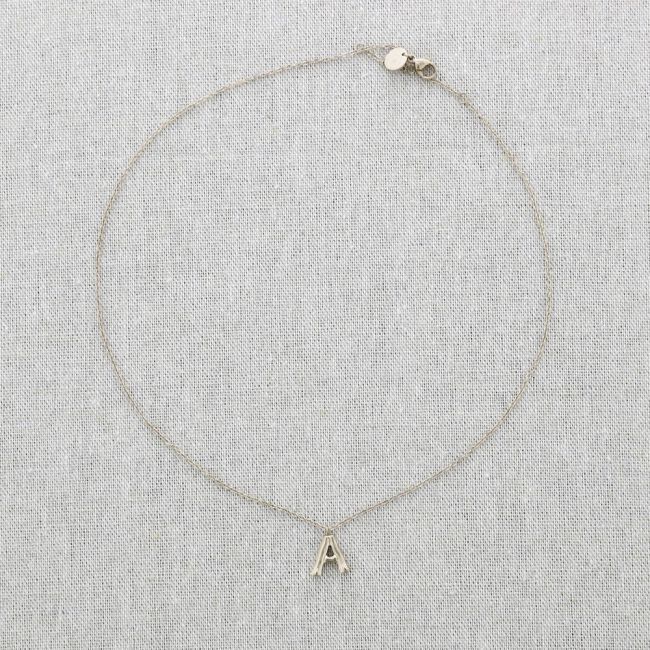 STEEL SHORT NECKLACE WITH BAMBOO INITIAL
