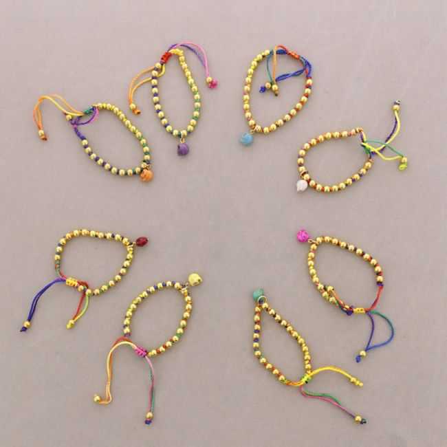 PULSERA ANUDADA BOLITAS