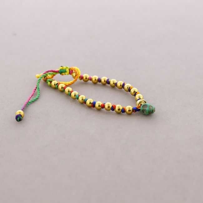 KNOTTED BRACELET WITH SMALL BEADS