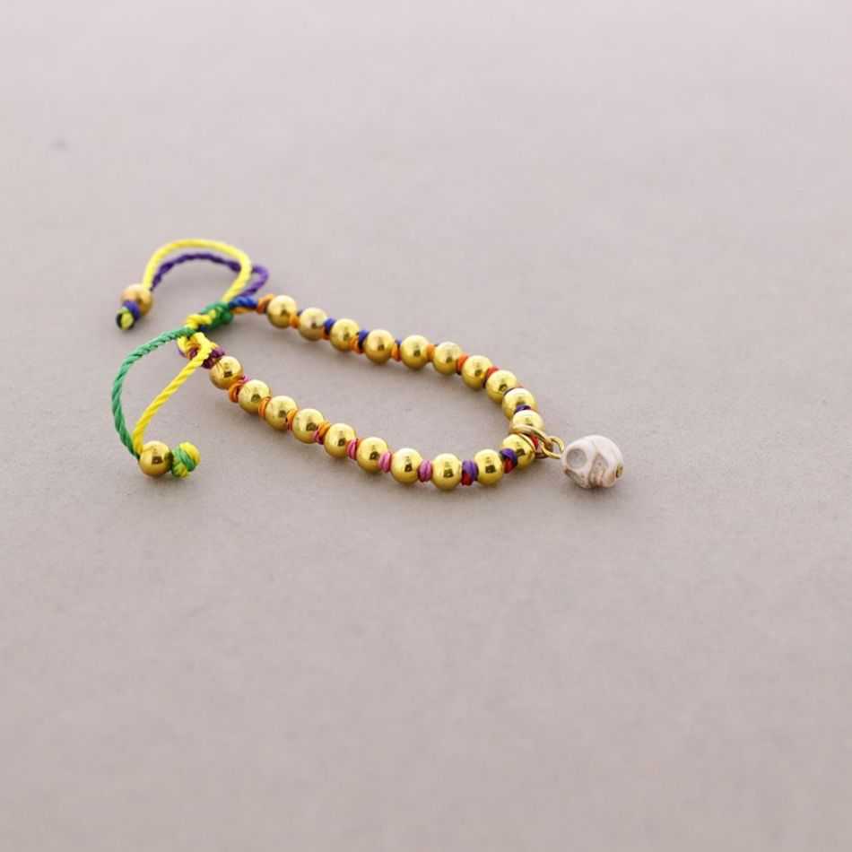 KNOTTED BRACELET WITH SMALL BEADS