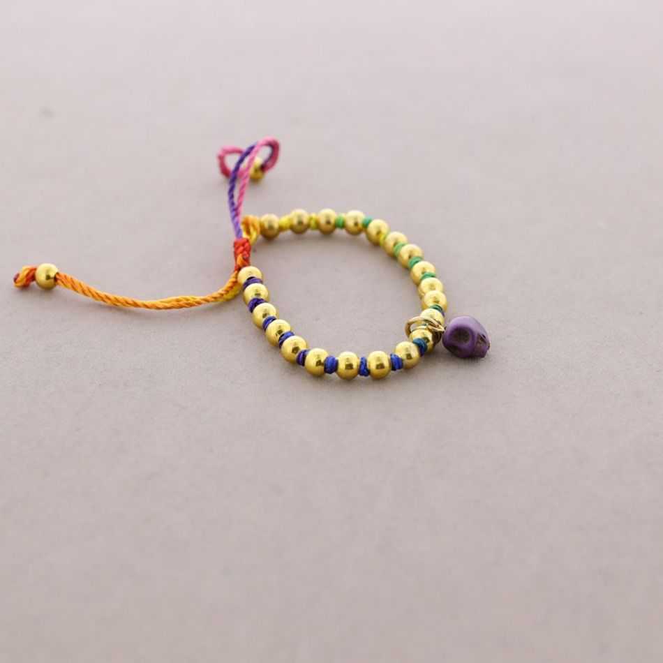 KNOTTED BRACELET WITH SMALL BEADS
