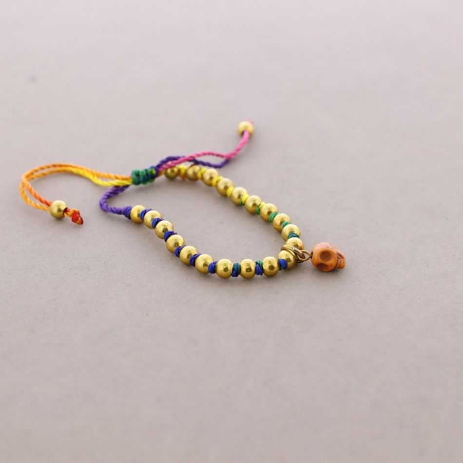 PULSERA ANUDADA BOLITAS