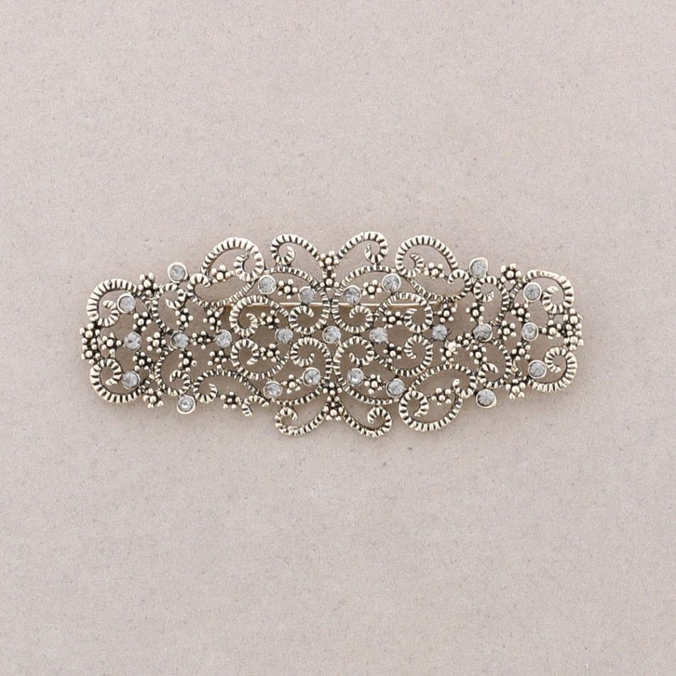 METAL CRYSTAL SADDLE BROOCH