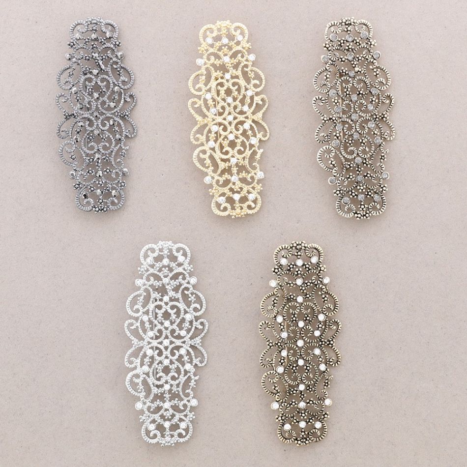 METAL CRYSTAL SADDLE BROOCH