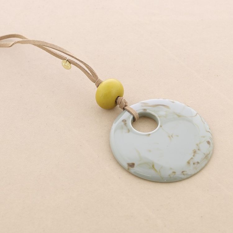 SUEDE LONG NECKLACE WITH RESIN PENDANT