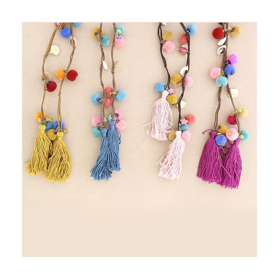 LONG SUEDE NECKLACE WITH DOUBLE FRINGE SHELL POMPOMS