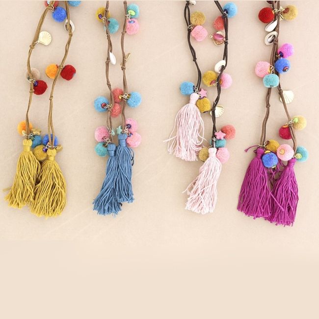 LONG SUEDE NECKLACE WITH DOUBLE FRINGE SHELL POMPOMS