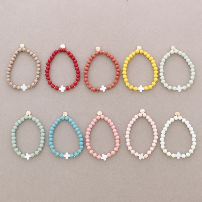ELASTIC BRACELET WITH NACRE CROSS BEADS