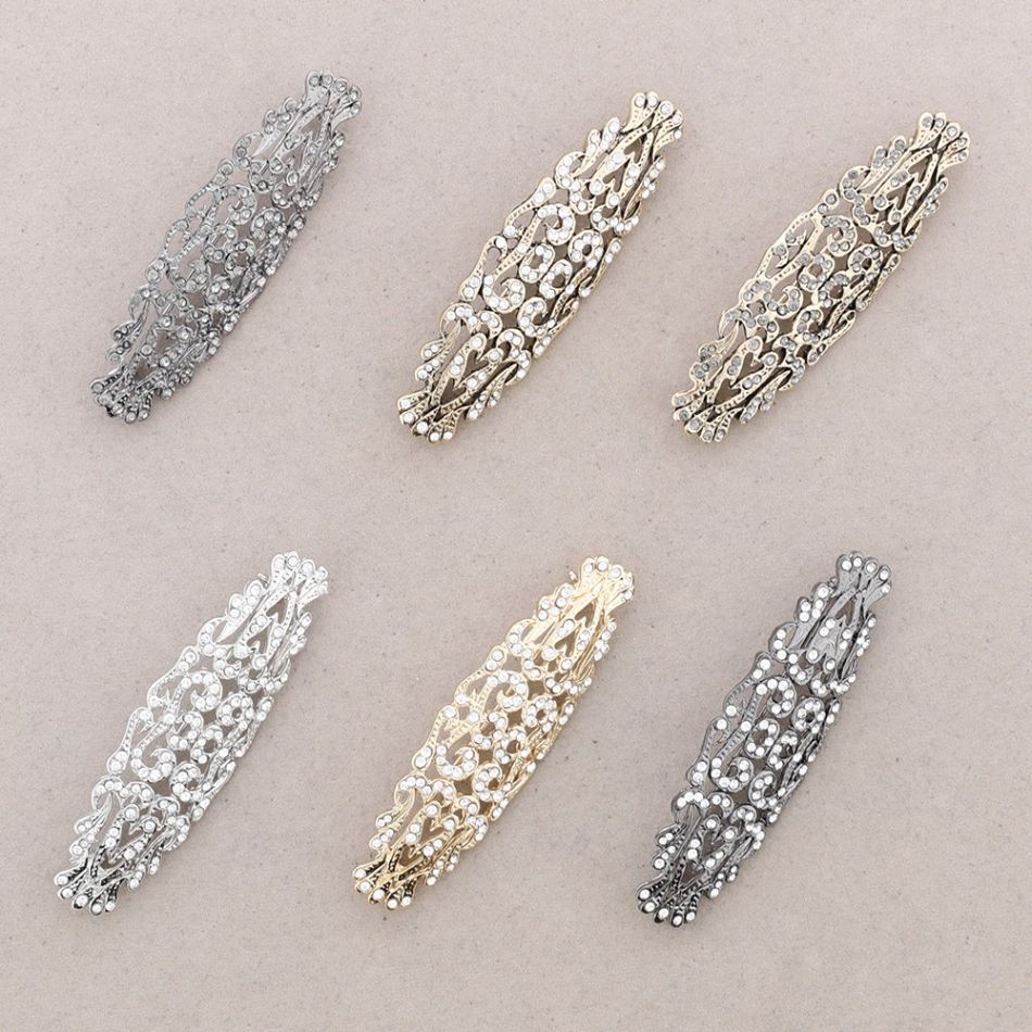 METAL CRYSTAL SADDLE BROOCH