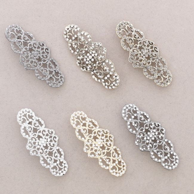 METAL CRYSTAL SADDLE BROOCH