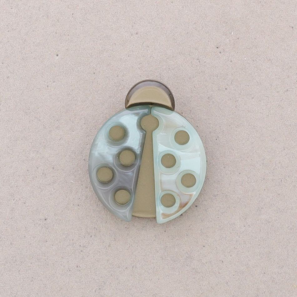 BROCHE MARIQUITA RESINA