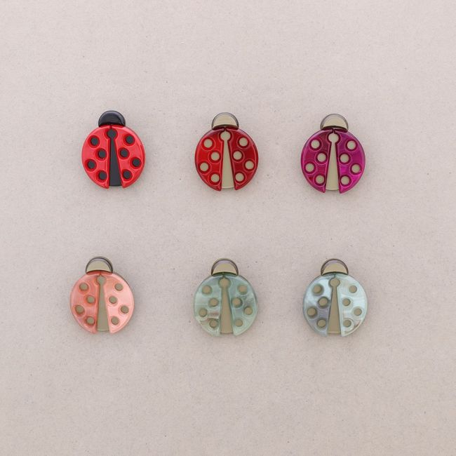 BROCHE MARIQUITA RESINA