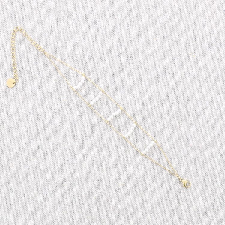 DOUBLE STEEL BRACELET WITH PEARLS