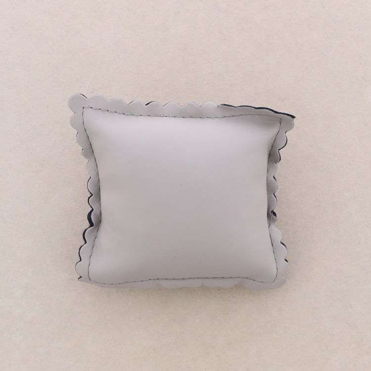 EXPOSITOR ALMOHADA POLIPIEL 9*9