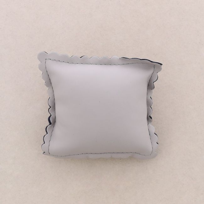 EXPOSITOR ALMOHADA POLIPIEL 9*9