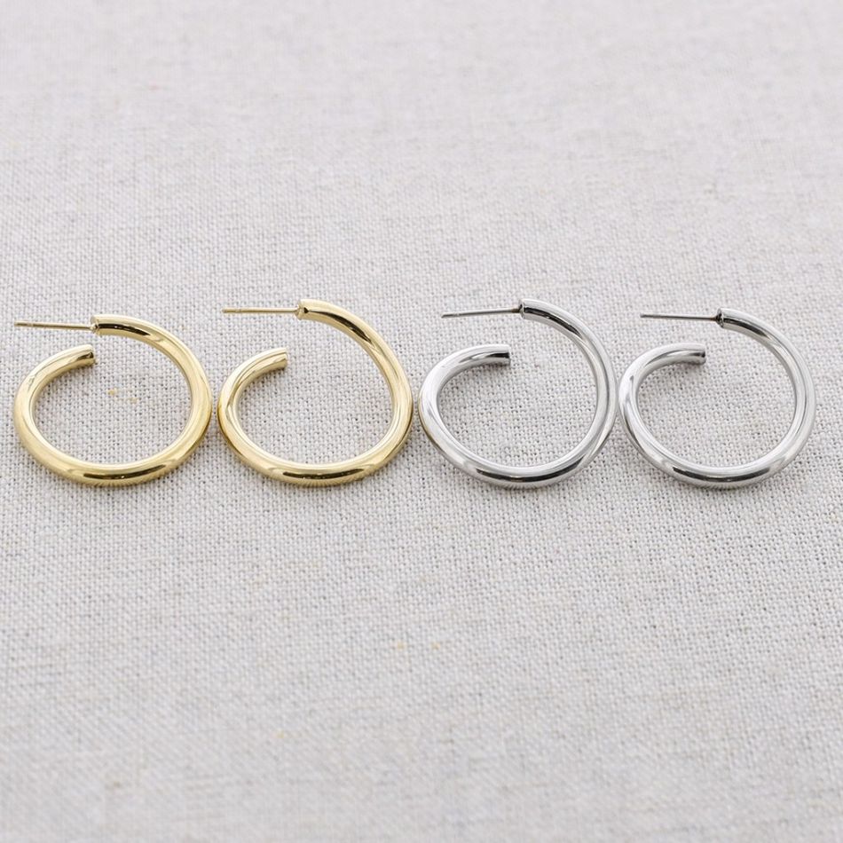 IRREGULAR SHAPED STEEL HOOP EARRINGS