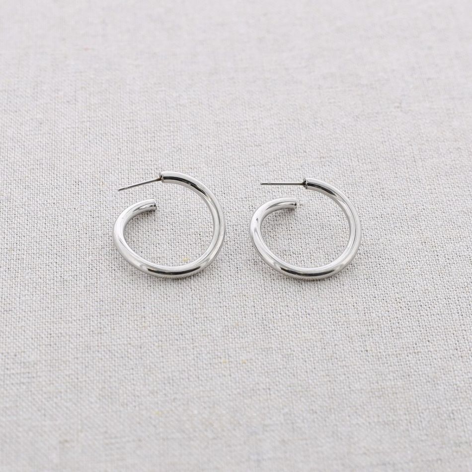 IRREGULAR SHAPED STEEL HOOP EARRINGS