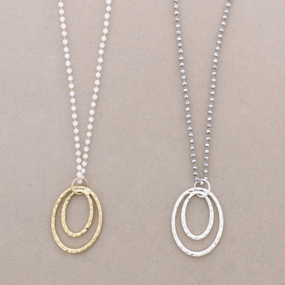 LONG NECKLACE WITH METAL PENDANT FACETED BEADS