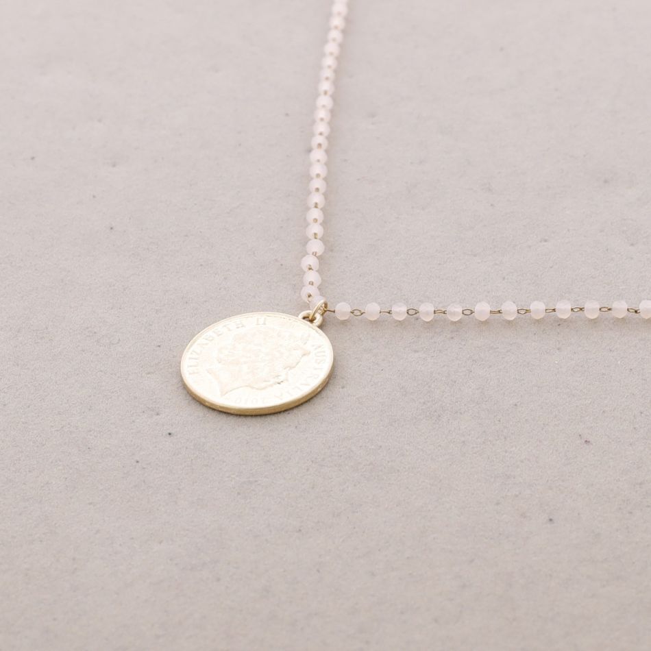 LONG NECKLACE WITH FACETED CRYSTALS AND METAL COIN PENDANT