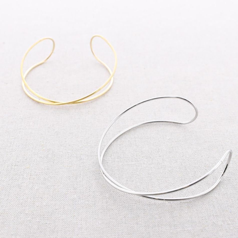 TWO CROSSED STRAPS ADJUSTABLE STEEL ARM CUFF