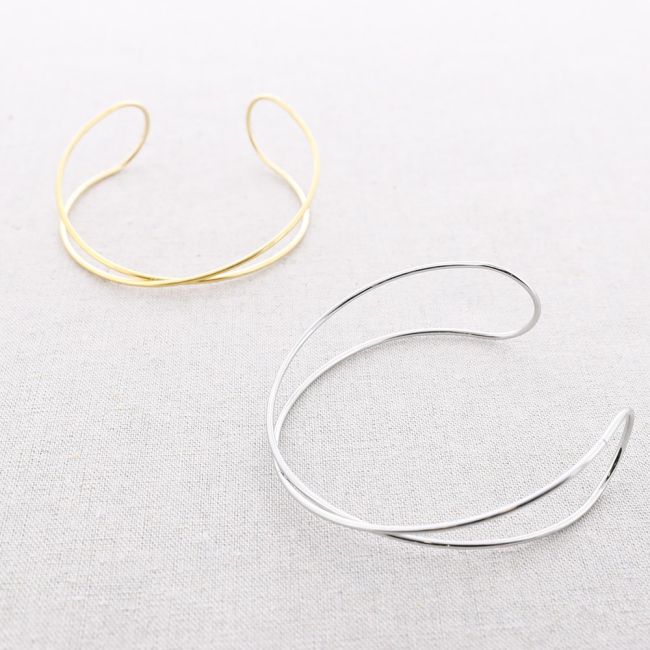 TWO CROSSED STRAPS ADJUSTABLE STEEL ARM CUFF