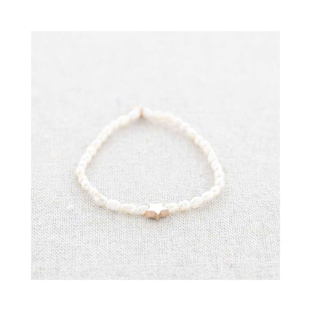 ELASTIC CULTURED PEARLS BRACELET WITH STEEL STAR
