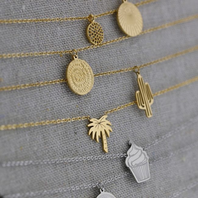 SET OF 12 ASSORTED STEEL SHORT NECKLACES AND DISPLAY