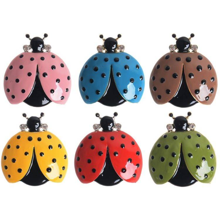 BROCHE MARIQUITA METAL ESMALTE LUNARES 2