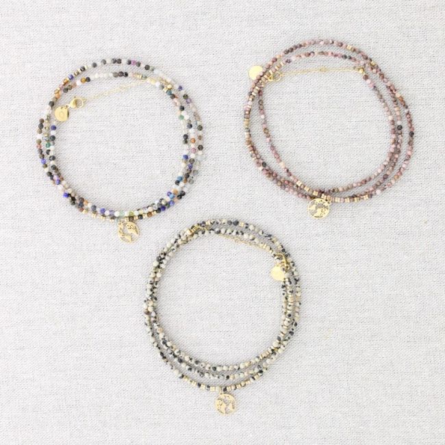 FOUR ROUND STEEL BRACELET WITH WORLD MAP PENDANT