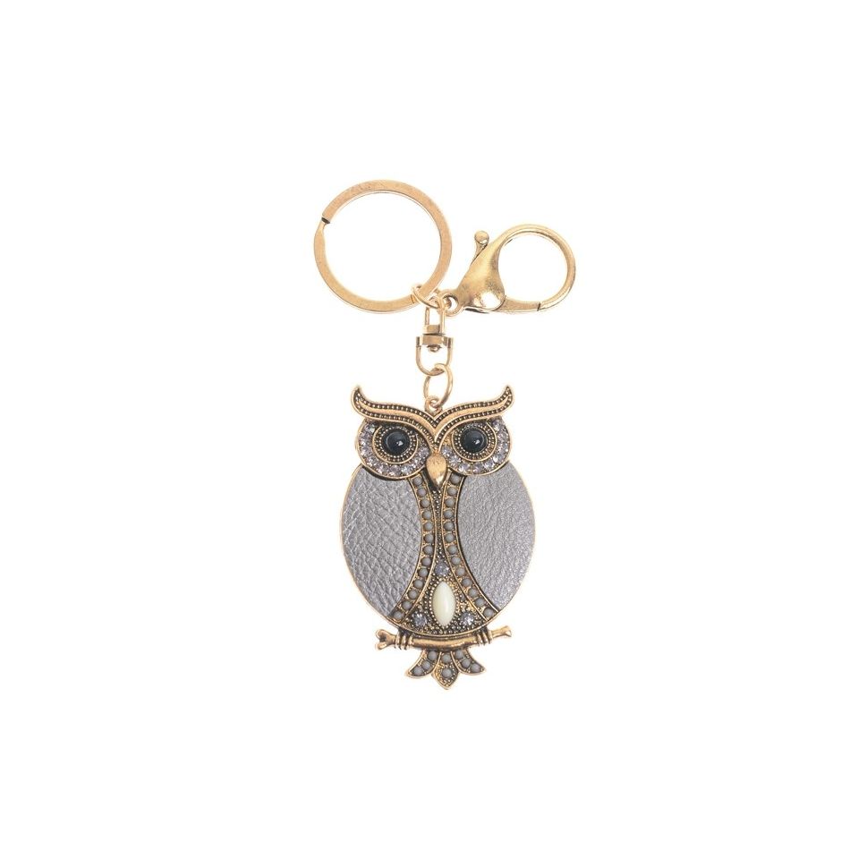 IMI FIGURE KEYCHAIN. LEATHER BEADS