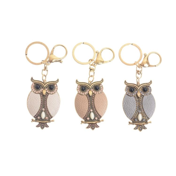 IMI FIGURE KEYCHAIN. LEATHER BEADS 2