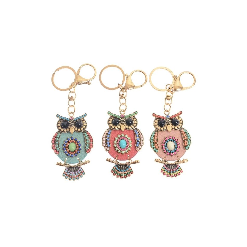 IMI FIGURE KEYCHAIN. LEATHER BEADS