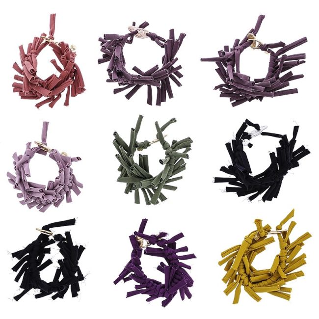 TUBE BRACELET WITH KNOTS
