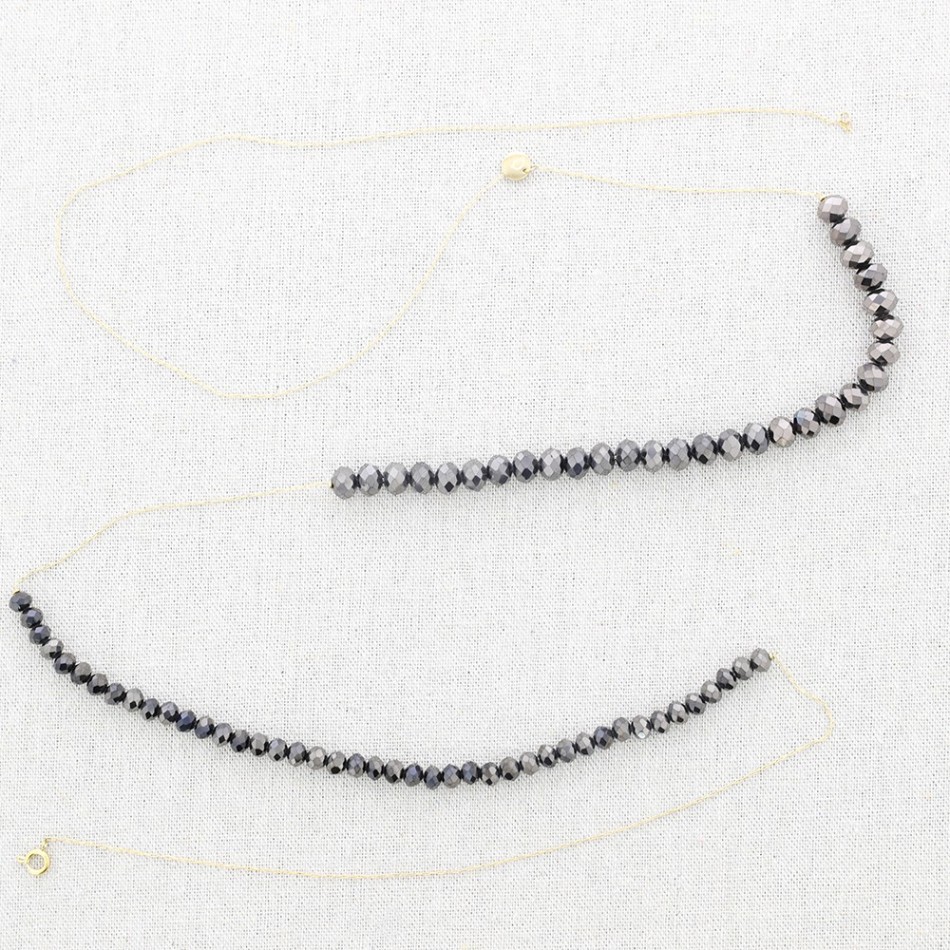 LONG STEEL NECKLACE WITH FACETED CRYSTAL BALLS