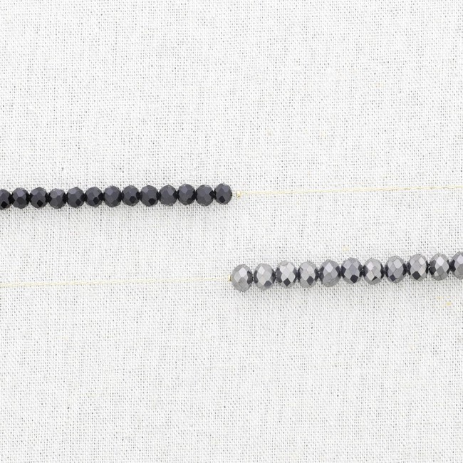 LONG STEEL NECKLACE WITH FACETED CRYSTAL BALLS