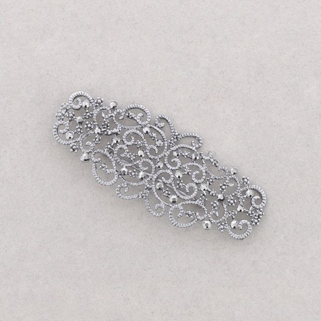 METAL CRYSTAL SADDLE BROOCH