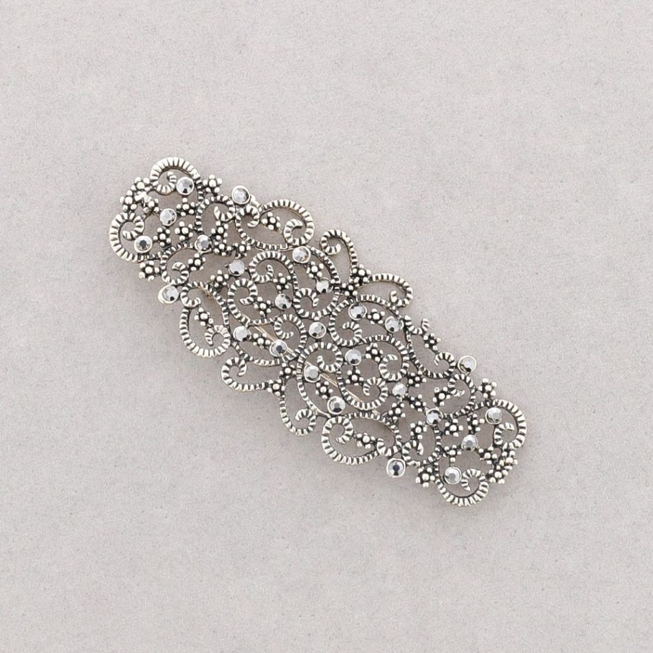 METAL CRYSTAL SADDLE BROOCH
